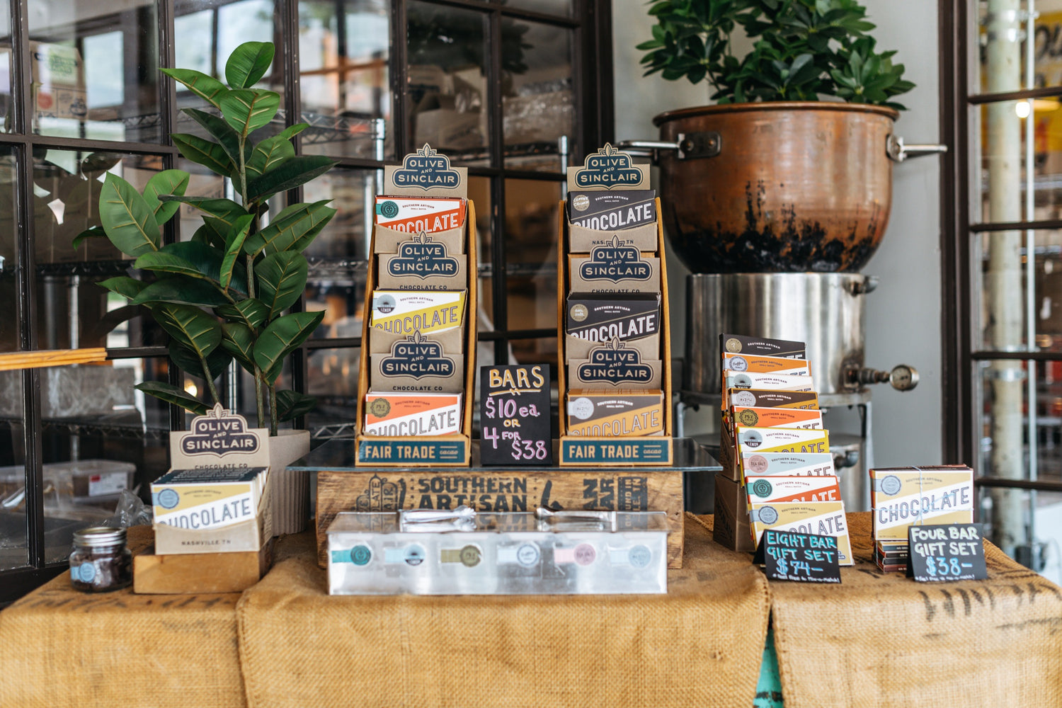 Olive and Sinclair chocolate bars on display in their retail store 