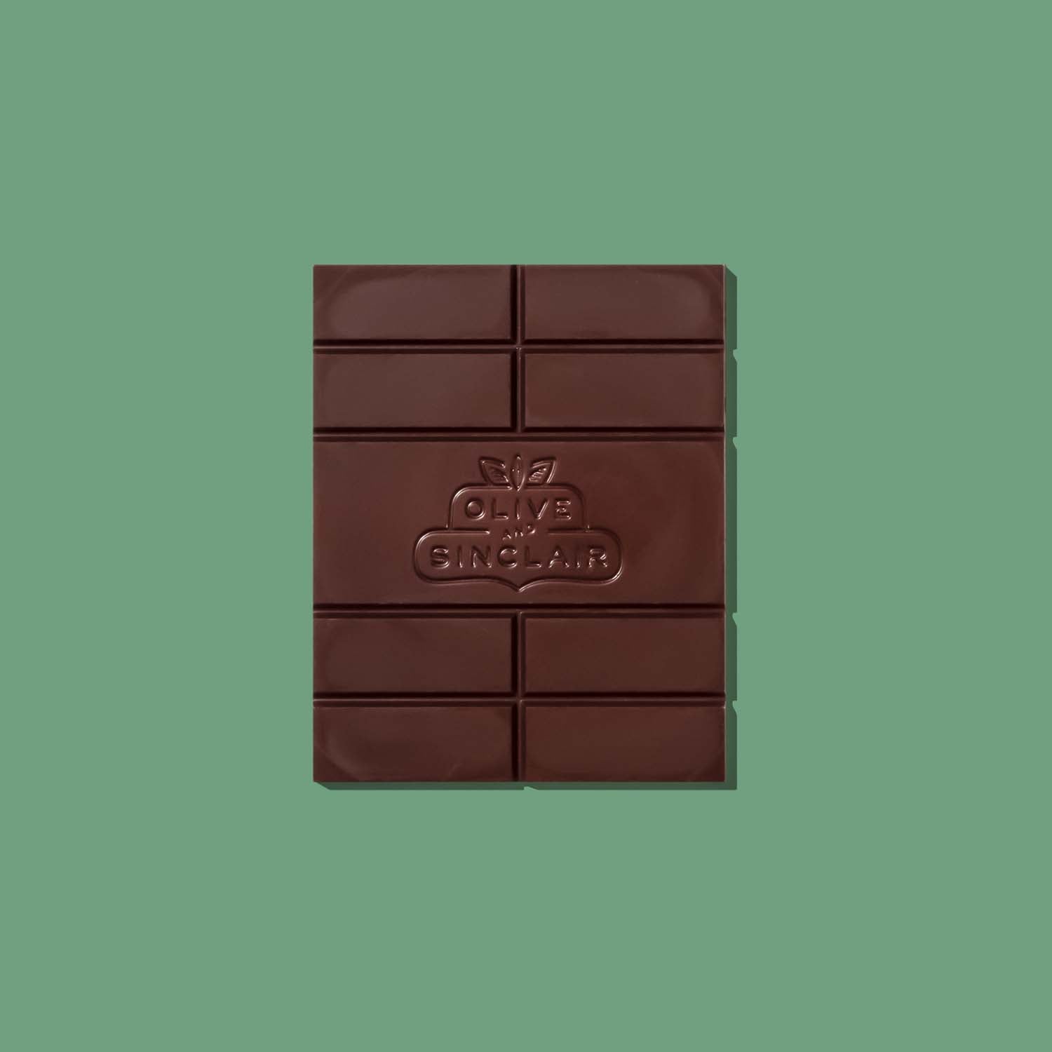 Olive and Sinclair Chocolate bar with a brand logo on a green background