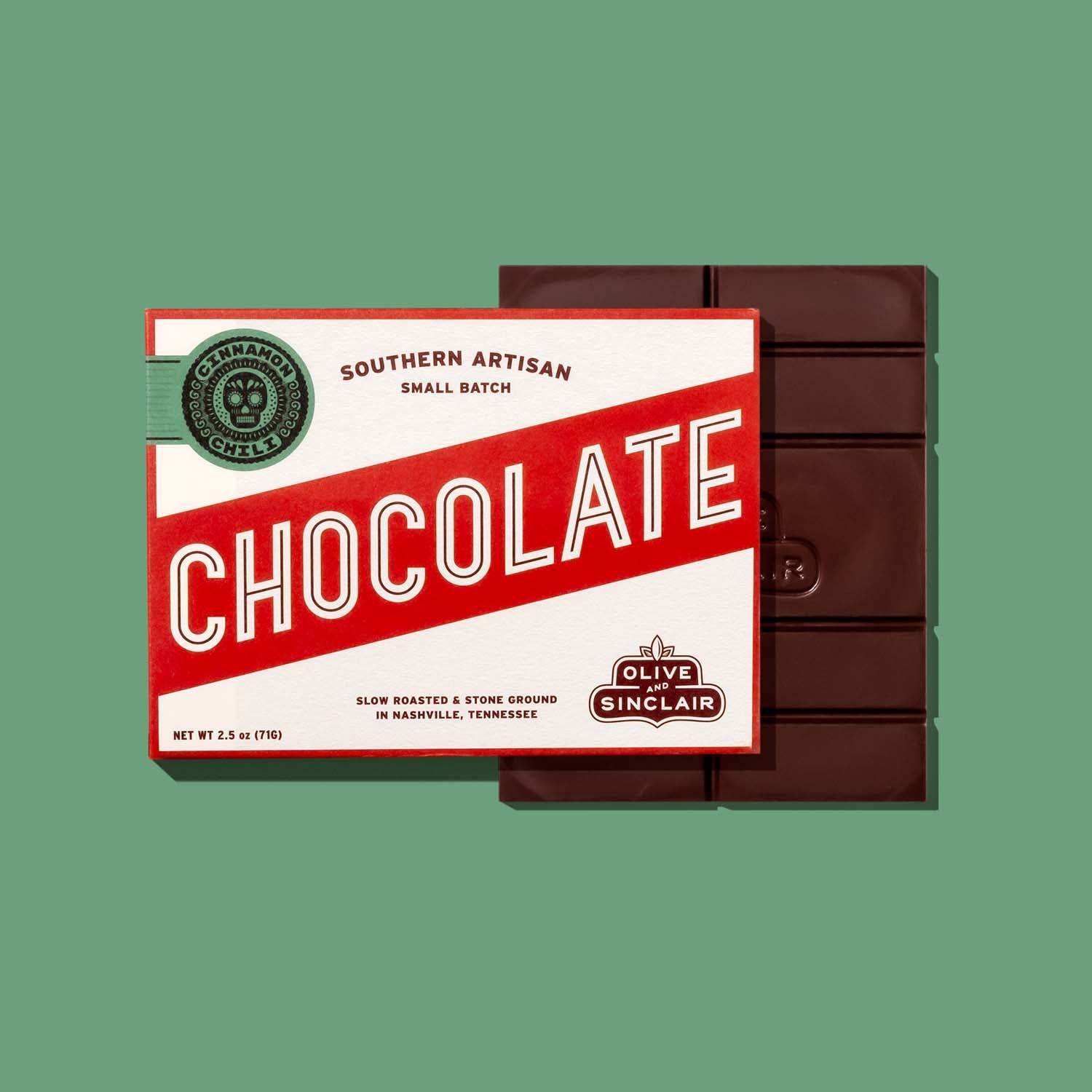 Chocolate bar with a red and white packaging featuring 'The Olive Sinclair' branding on a green background.