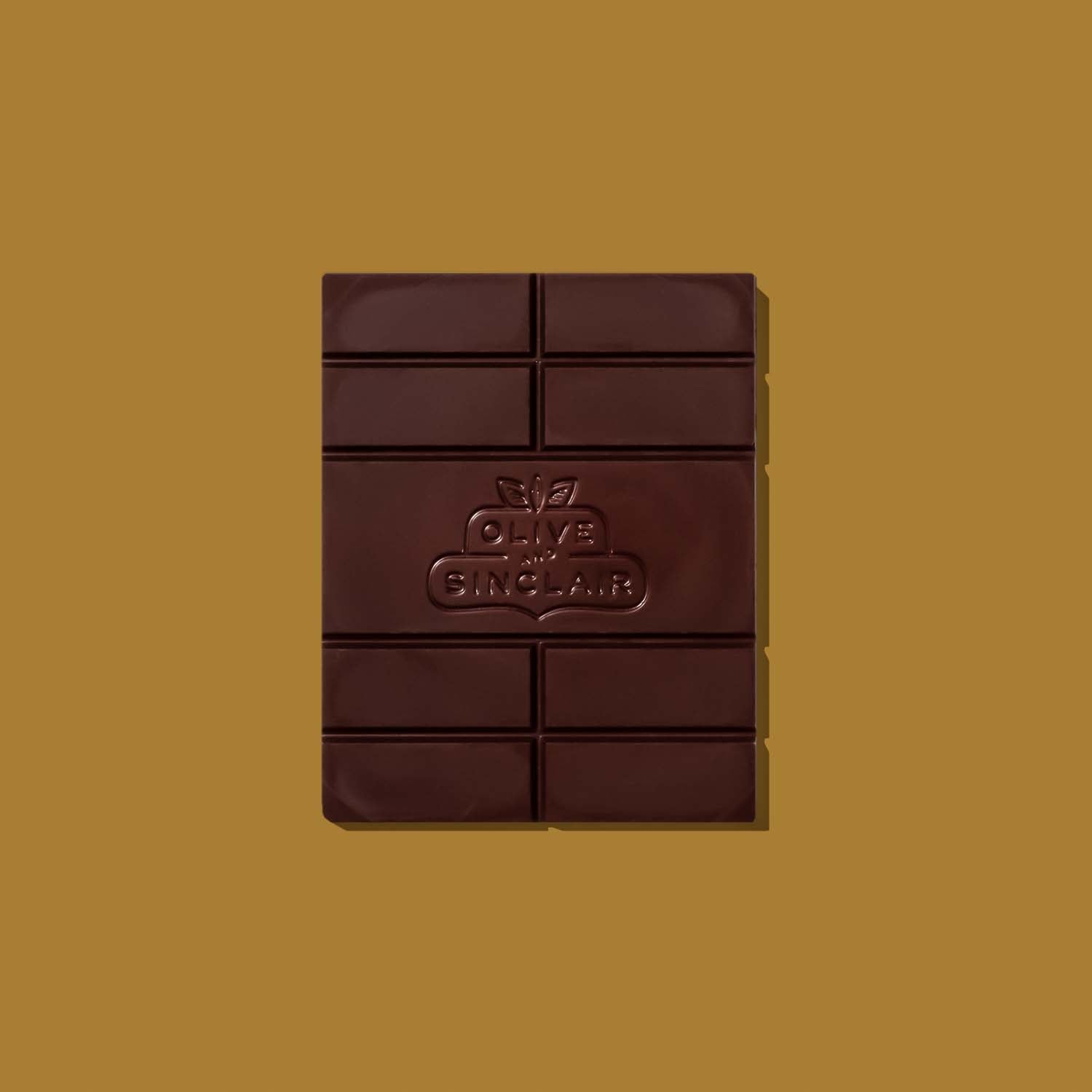 75% Chocolate bar with an Olive and Sinclair brand logo on a mustard yellow background