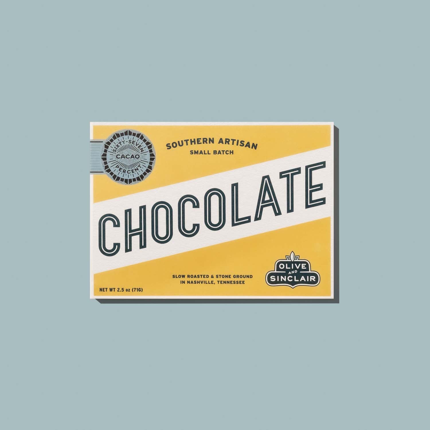 Box of Olive Sinclair 67% Cacao chocolate on a light blue background