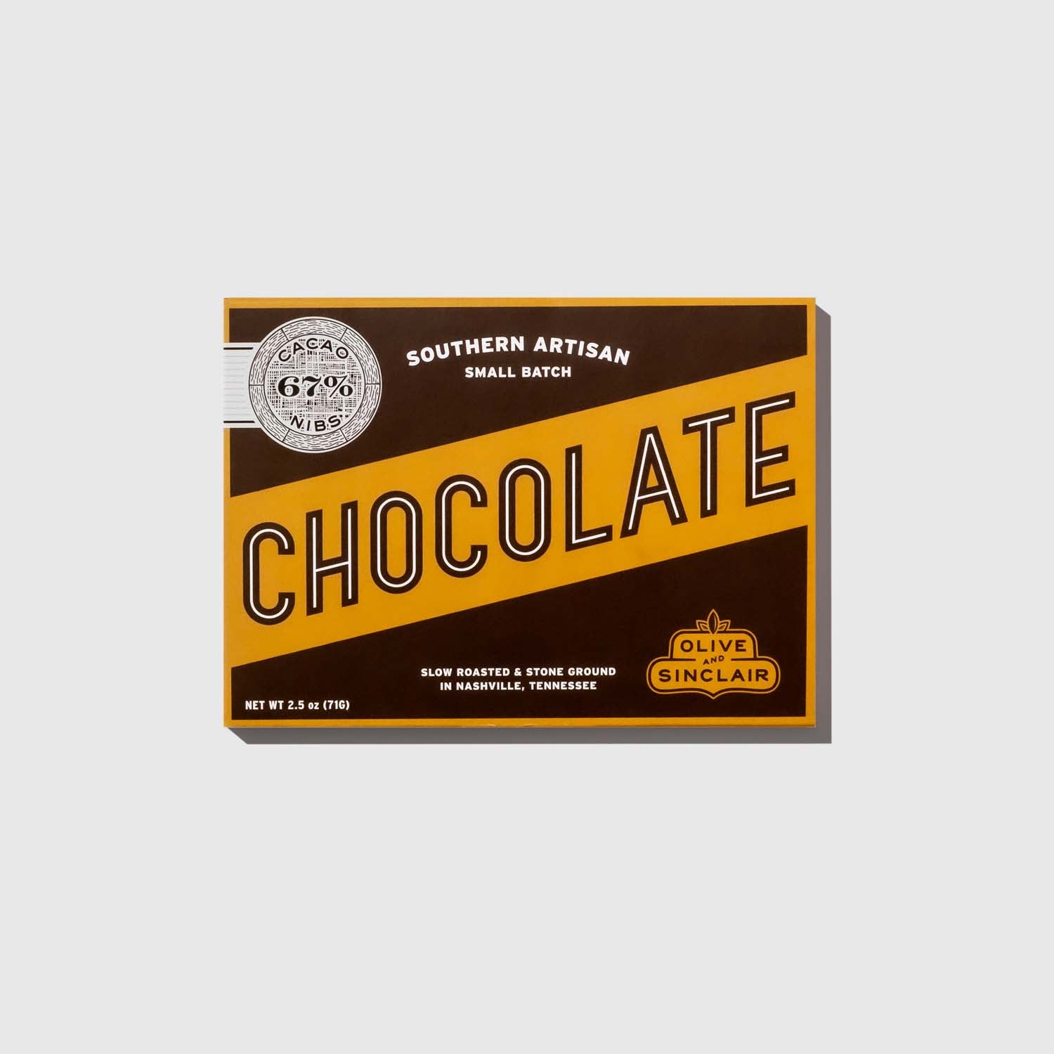 Box of Olive Sinclair cacao nibs chocolate on a light gray background